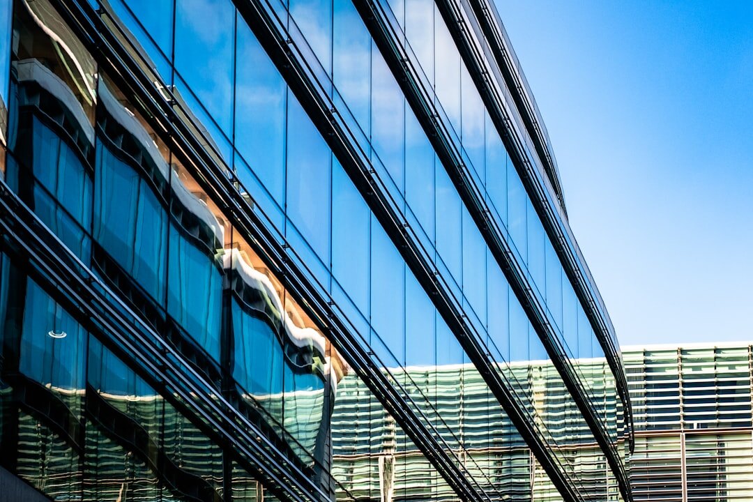 Modern office building exterior with large glass windows