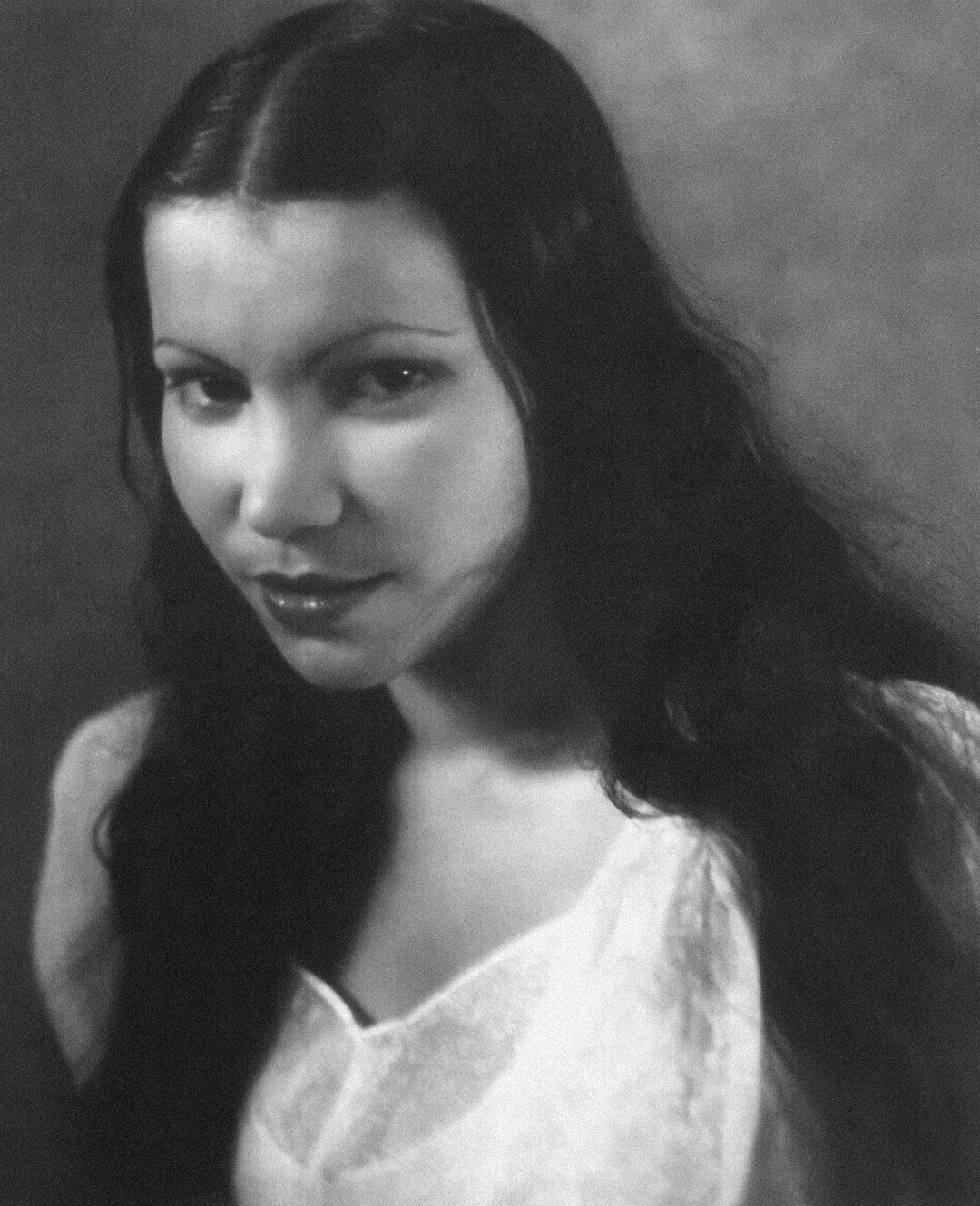 Studio portrait of a young Finnish woman with long dark hair