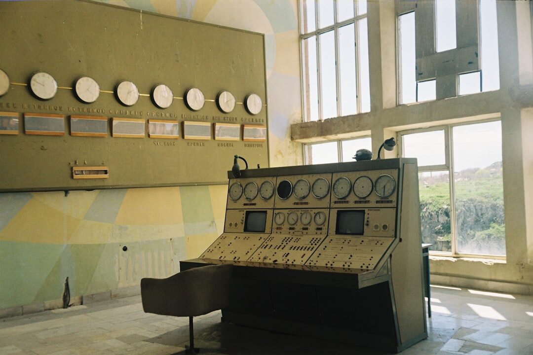 Television control room with multiple video monitors and a switching console