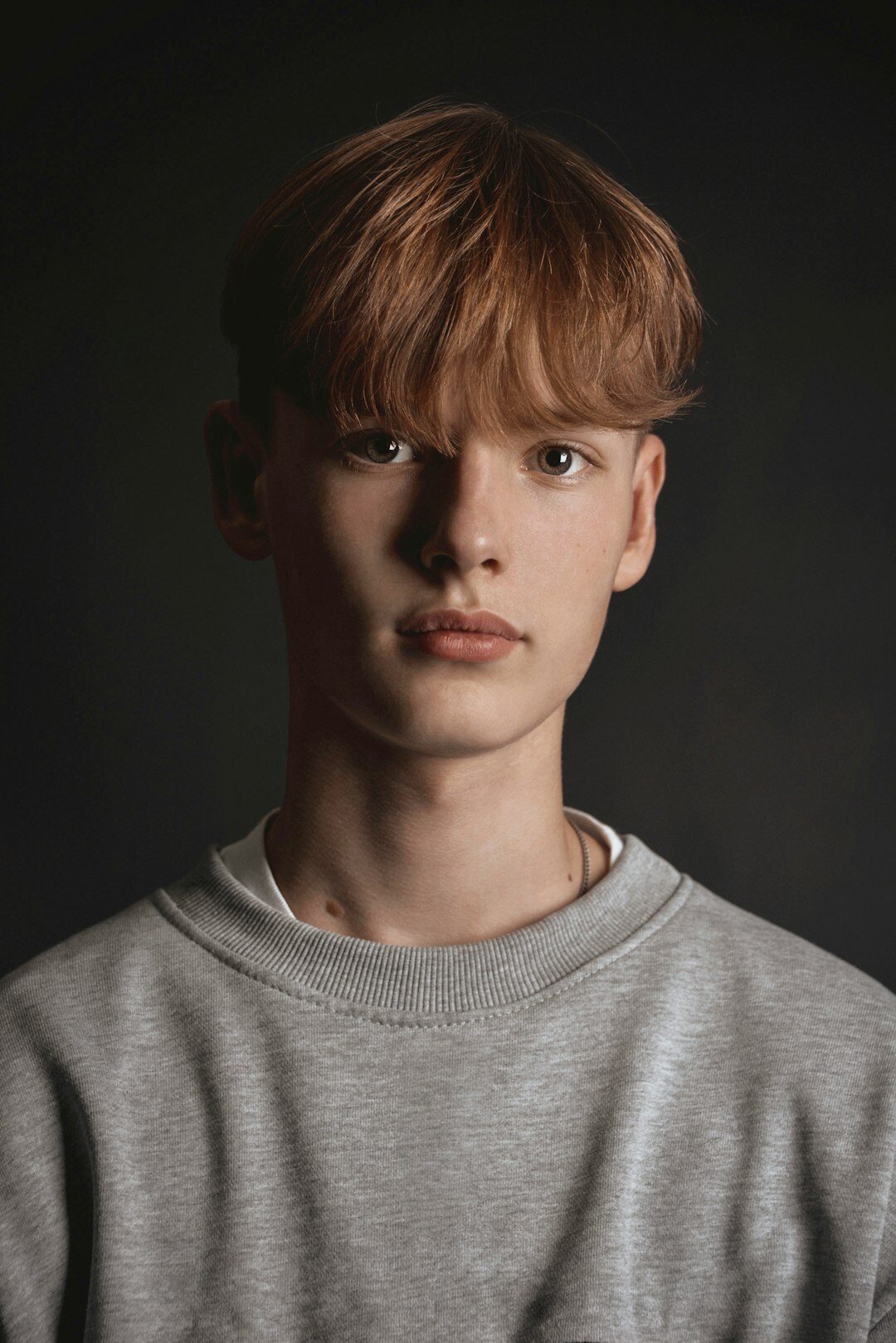 Studio portrait of a young Finnish man with short hair
